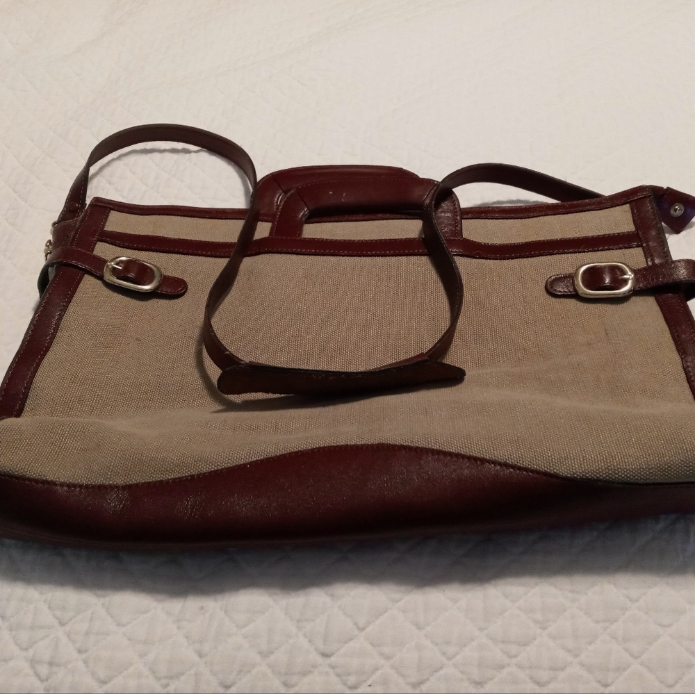 Canvas and leather trimmed brief or laptop case. Tan and Burgandy color.